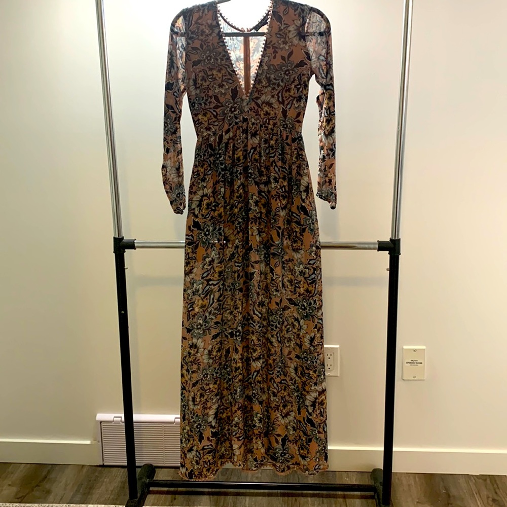 Summer deep V neck dress with flowing vibes.